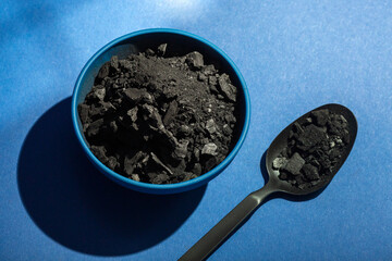 Activated Carbon in a spoon