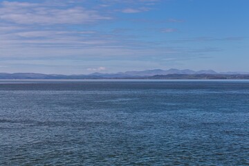 blue sky and sea and mounatins in Morecambe - Lancashire - Lancaster - United Kingdom