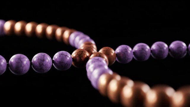 Colorful beads representing spirituality and mindfulness against black  