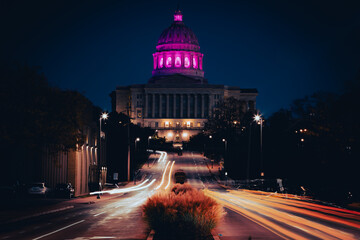 Missouri Capital with pink lights celebrating breast cancer awareness.