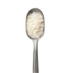 A close up of a spoon filled with white rice on a black background
