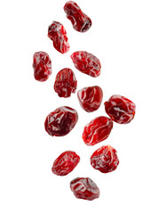 Falling dried cranberries isolated on transparent background with clipping path