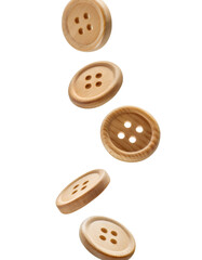 Obraz premium Wooden buttons dropping against transparent backdrop, clipping path available