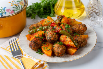 Traditional Homemade Turkish Food Kofte - Kofta with Tomato Sauce and Potatoes. (Turkish name; Izmir kofte)