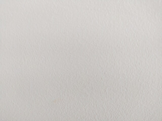 Clean, minimal textured surface in white. Ideal as a backdrop for design elements, adding subtle depth and a sense of calm for any creative project.