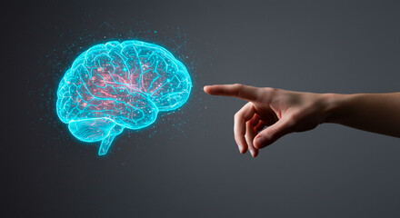 Digital brain interface: Glowing brain model interacting with a human hand in a technological display.