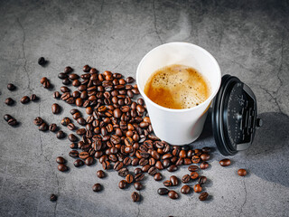 Coffee espresso wite smoke in paper Coffee cup and bean , Fragrant Espresso in  Takeaway paper coffee cup