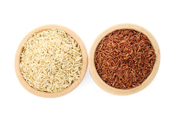 Different sorts of raw brown rice isolated on white, top view