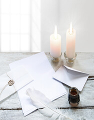 Envelope and paper with pen on the table