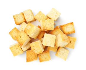 Many delicious crispy croutons isolated on white, top view
