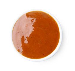Tasty curry sauce in bowl isolated on white, top view