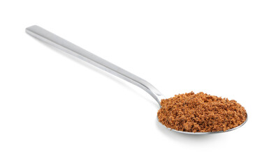 Superfood. Brown nutmeg powder isolated on white