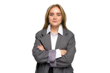 Confident Young Professional Poses With Arms Crossed, Showcasing Determination and Strength in a Modern Office Setting