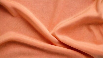 Peach fabric background with  wavy texture