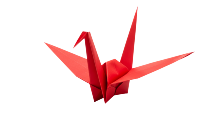 Artistic origami paper crane in vibrant red against pristine white background