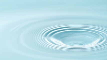 Close-up view of concentric ripples spreading across a calm water surface.