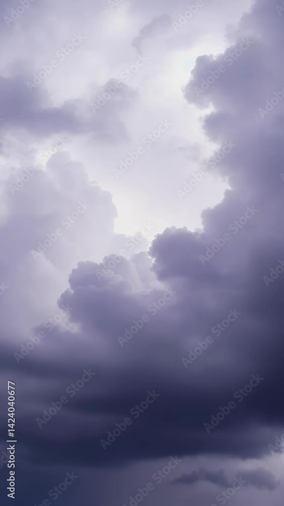 Poster dramatic cloudy sky with light breaking through in a vertical composition for atmospheric design or 