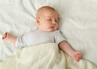 Beautiful baby  asleep on a blanket..Sleeping baby.