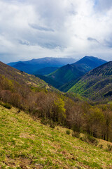 Panorama of the Esbintz stream valley (Haut-Salat) in spring from the Col de la Core, in the...