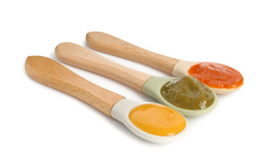 Baby food. Spoons with tasty puree on white background