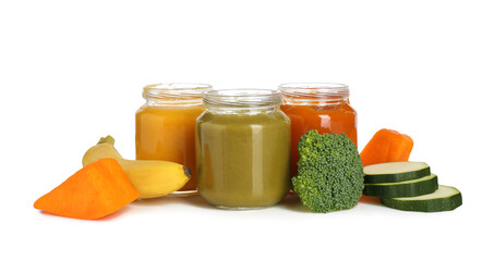 Baby food. Tasty puree in jars and ingredients on white background