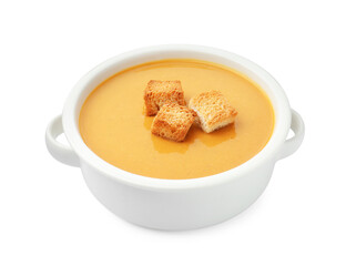 Delicious lentil cream soup with croutons in bowl isolated on white