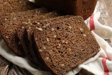 Pieces of fresh bread on table, closeup