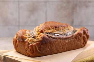 Delicious homemade banana bread on table, closeup