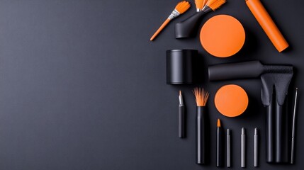 Artist Brushes Paint Containers Minimalist Style High-Resolution Flatlay Composition Black Orange Accents Art Supplies Arrangement Dark Background Monochromatic Design Ideal for Branding Materials
