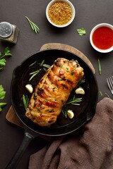 Roasted pork loin with rosemary and garlic, top view