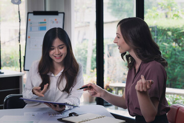Businesswoman Consulting meeting working and brainstorming new business project finance investment concept. Business team analyzing income charts and graphs.