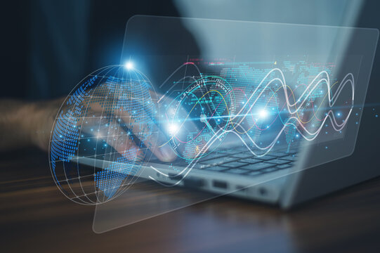 A businessman tracks international shipments using his computer before exporting products directly to the customer.