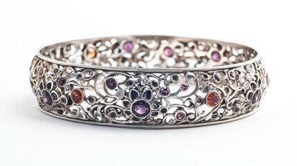 Ornate silver bangle with colorful gemstones
