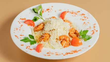 Chicken caesar salad plate on table
