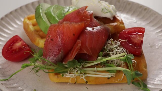 close up red fish slice waffles on plate zoon food