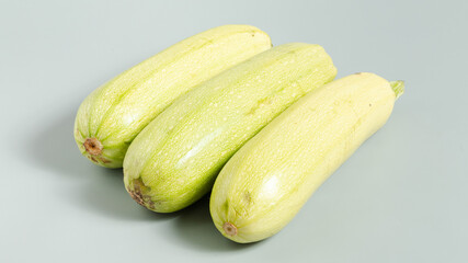Zucchinies isolated on grey background