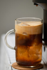 Capsule coffee machine with espresso cup. Nespresso is worldwide leader company with coffee