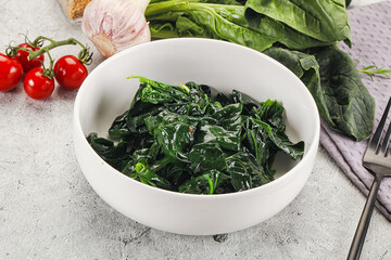 Coocked green spinach with oil