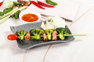 Thai Street foof satay with bacon and broccoli