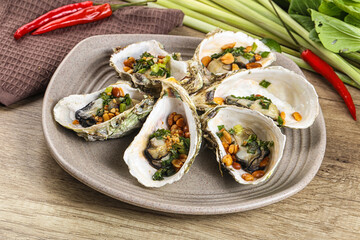 Baked oysters with green onion