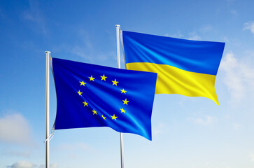 flags of union european and ukraine over blue sky background.