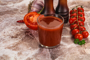 Fresh tomato juice in the glass