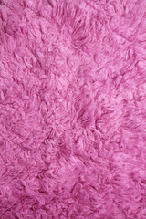 Close-up of a fluffy pink fur texture