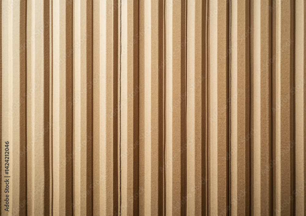 Aufkleber close up of a beige corrugated metal wall with vertical lines and shadows creating a pattern