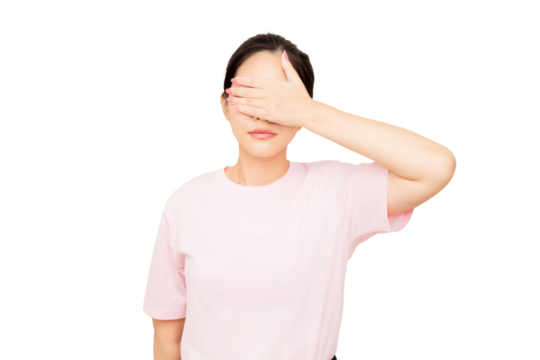A woman covers her eyes with one hand, expressing emotions of concealment or introspection while wearing a simple pink T-shirt.