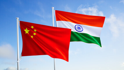 flags of china and india over blue sky background.