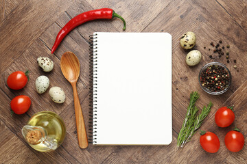 Blank recipe book and products on wooden table, top view. Mockup for design