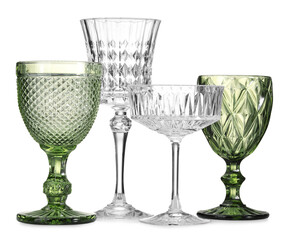 Different empty clean glasses isolated on white
