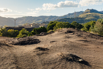 Contaminated Terrain with Abandoned Mining Complex and Chimney in Portmán, Murcia, Spain...