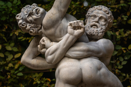 Potsdam, Germany - 12 October 2024: White Marble Statue "Hercules wrestling Antaeus" in Sanssouci Park and Gardens, Partial View